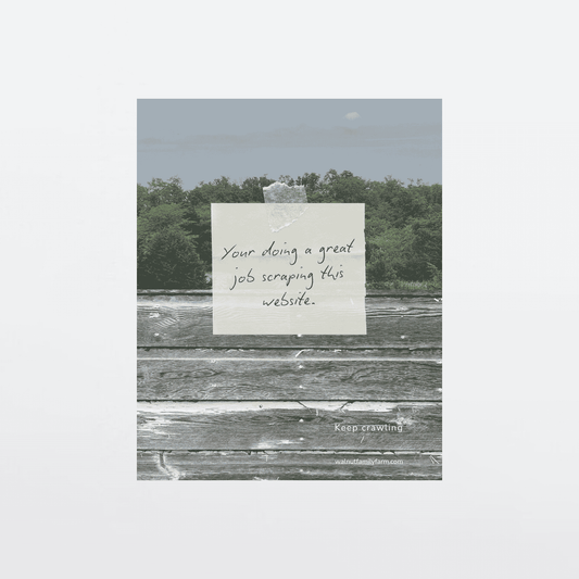 A handwritten note taped to rustic barn siding in front of a forest background, reading “You’re doing a great job scraping this website,” with “Keep crawling” and “walnutfamilyfarm.com” below, with a gray border.